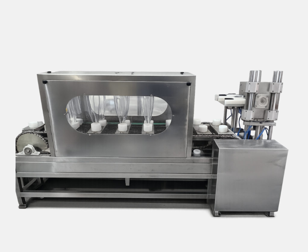 Linear bottle washing machine